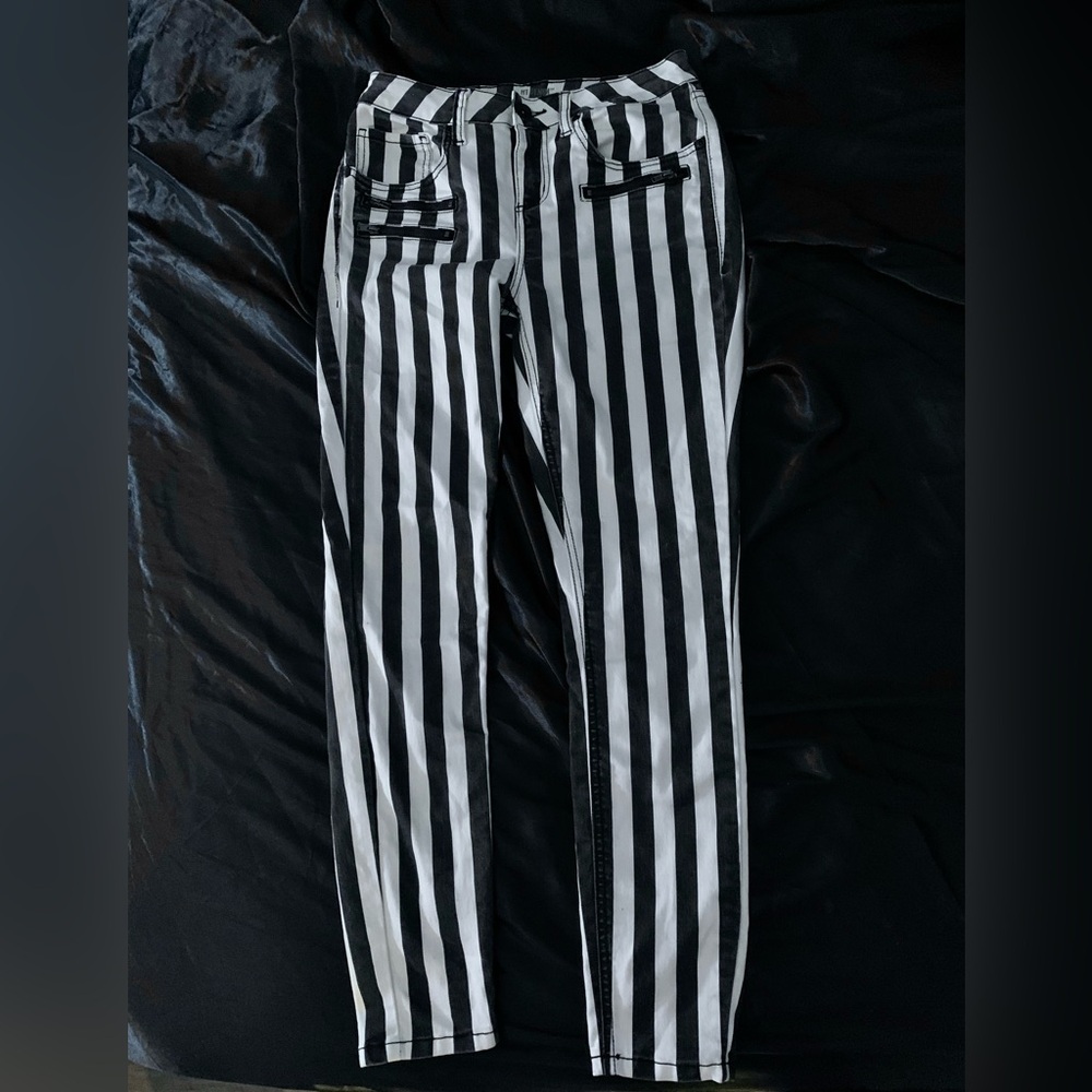 Hi rise super skinny black and white striped jeans from Hot Topic.